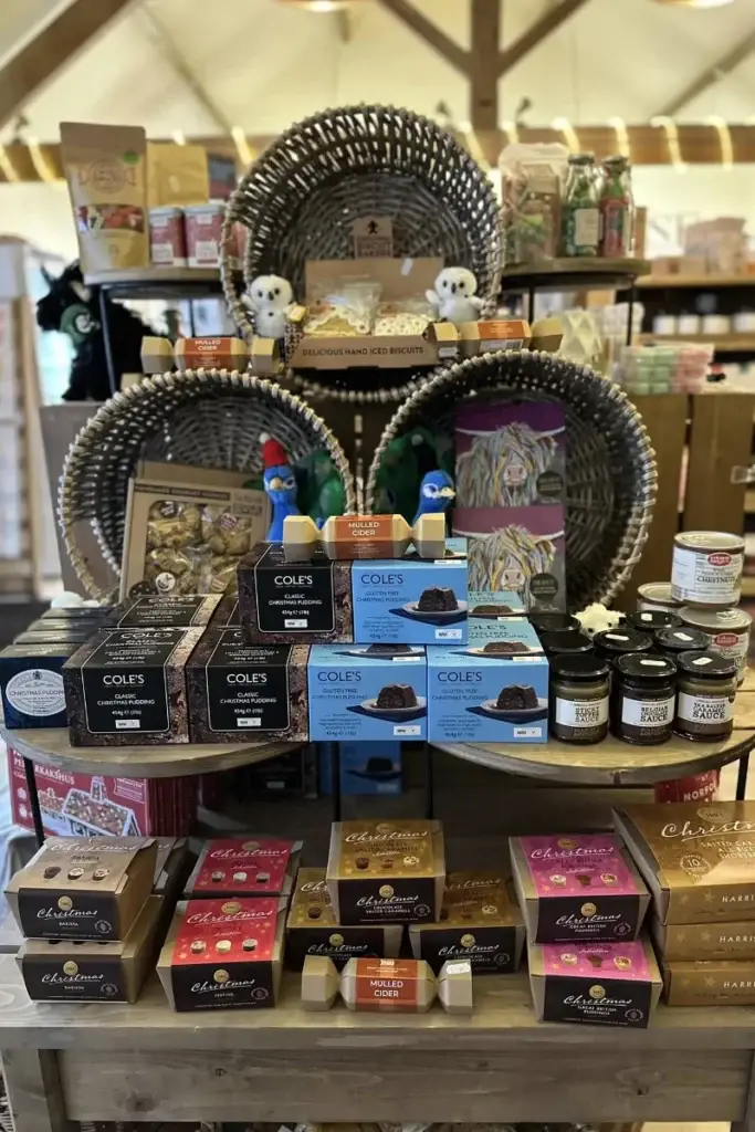 Farm shop display with chocolates, jams, biscuits and local gift products at Yare Valley